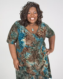 V-neck asymetrical top with an impressionist-style pattern in blues and browns